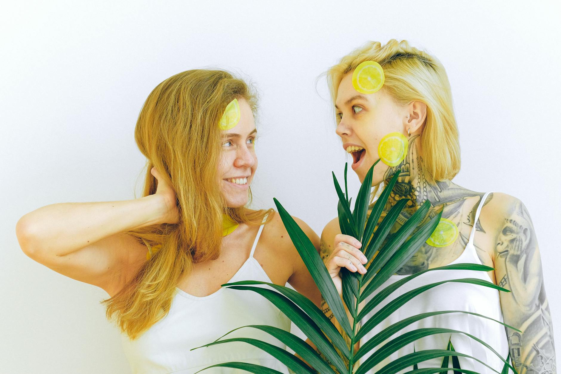 A young couple standing together indoors, representing modern intimacy and healing connection.